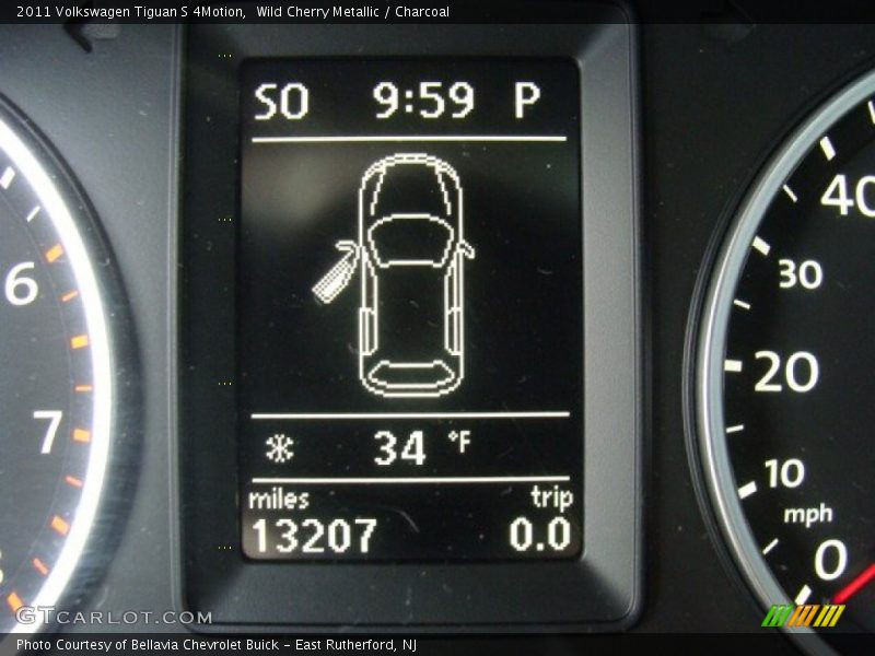 Wild Cherry Metallic / Charcoal 2011 Volkswagen Tiguan S 4Motion