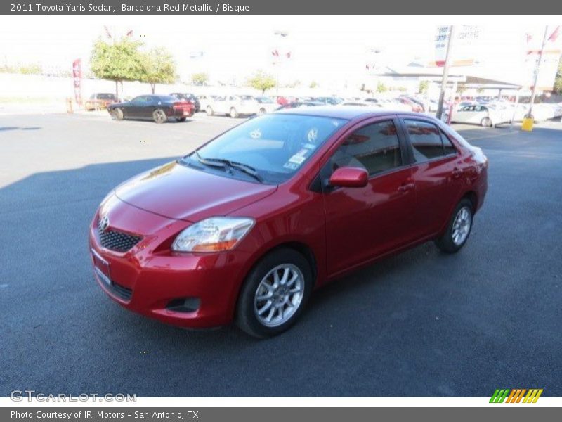 Barcelona Red Metallic / Bisque 2011 Toyota Yaris Sedan