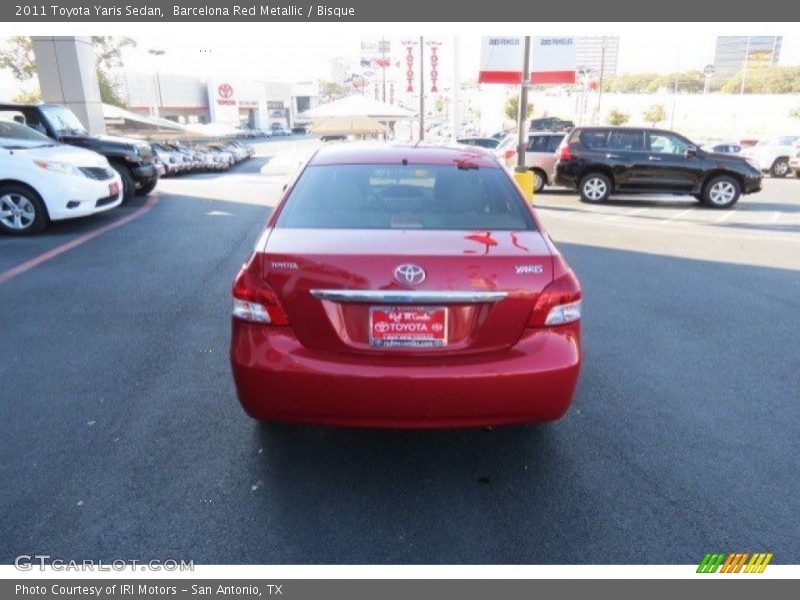 Barcelona Red Metallic / Bisque 2011 Toyota Yaris Sedan