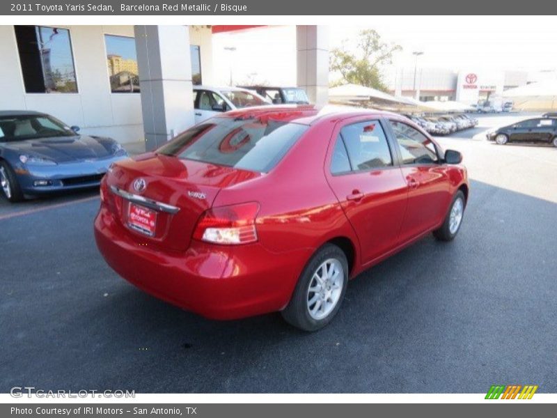 Barcelona Red Metallic / Bisque 2011 Toyota Yaris Sedan