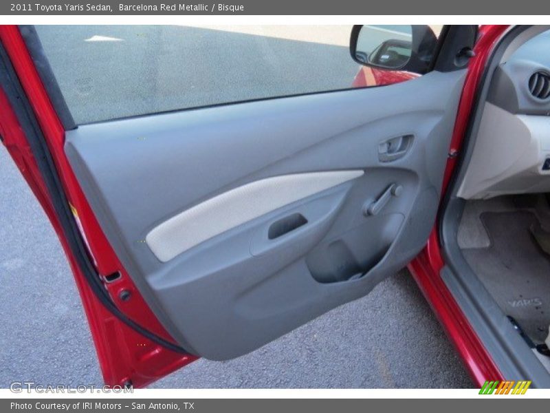 Barcelona Red Metallic / Bisque 2011 Toyota Yaris Sedan
