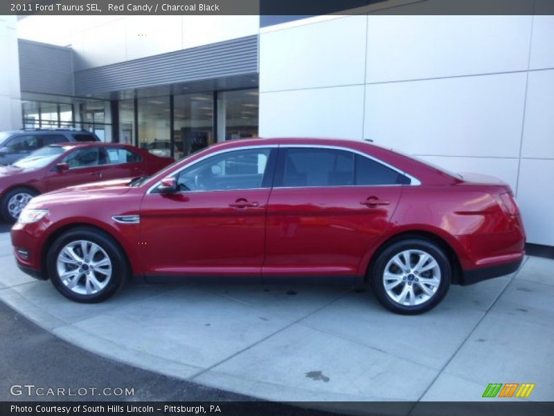 Red Candy / Charcoal Black 2011 Ford Taurus SEL