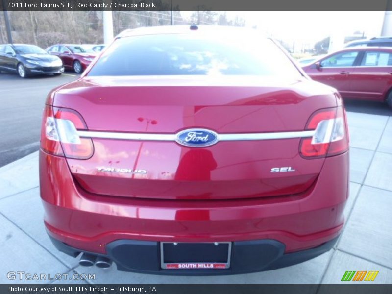 Red Candy / Charcoal Black 2011 Ford Taurus SEL