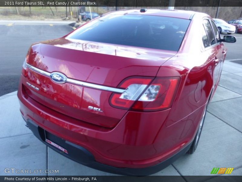 Red Candy / Charcoal Black 2011 Ford Taurus SEL
