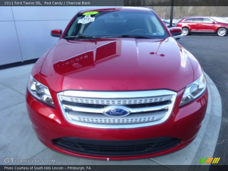 Red Candy / Charcoal Black 2011 Ford Taurus SEL