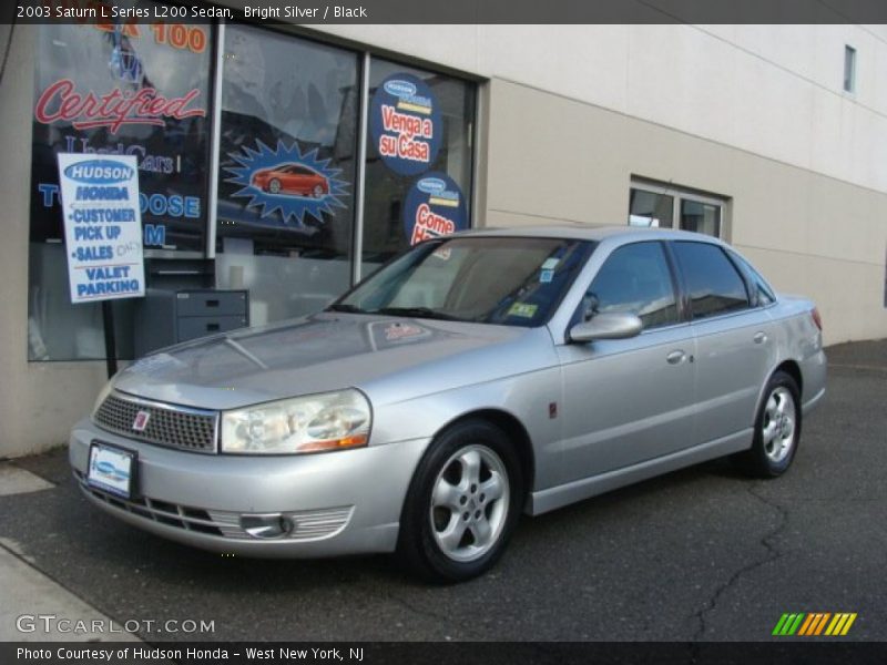 Bright Silver / Black 2003 Saturn L Series L200 Sedan