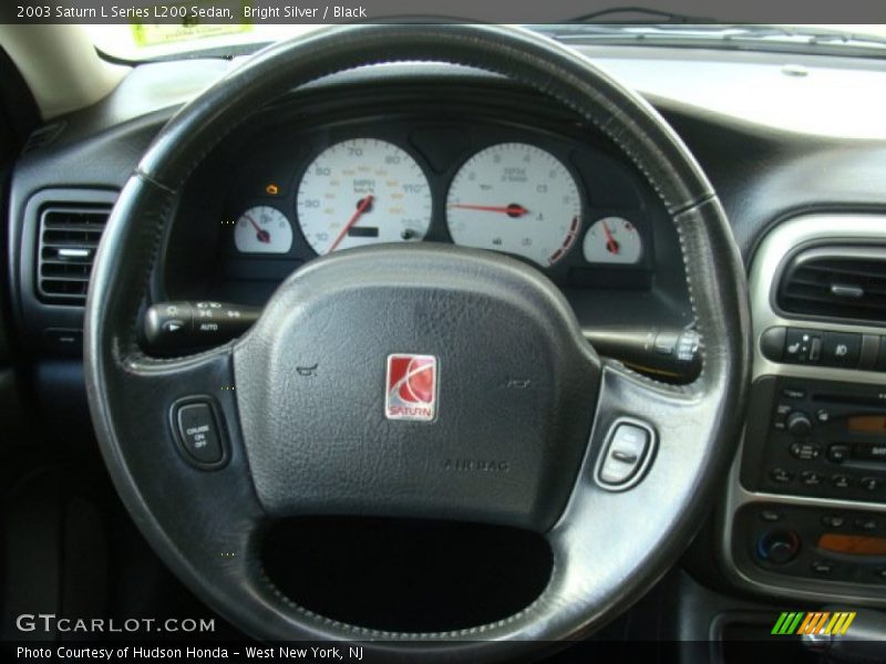 Bright Silver / Black 2003 Saturn L Series L200 Sedan