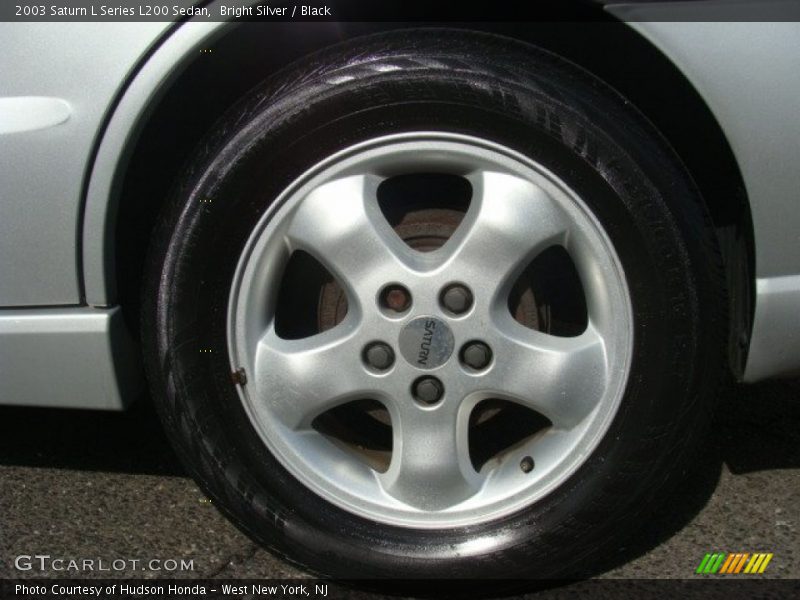 Bright Silver / Black 2003 Saturn L Series L200 Sedan