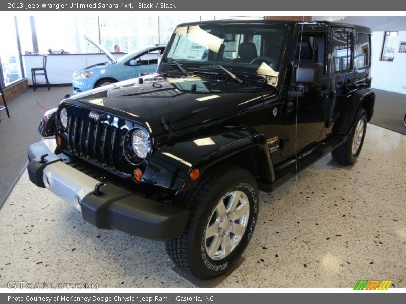 Black / Black 2013 Jeep Wrangler Unlimited Sahara 4x4