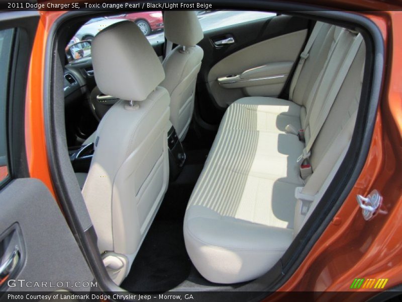 Toxic Orange Pearl / Black/Light Frost Beige 2011 Dodge Charger SE