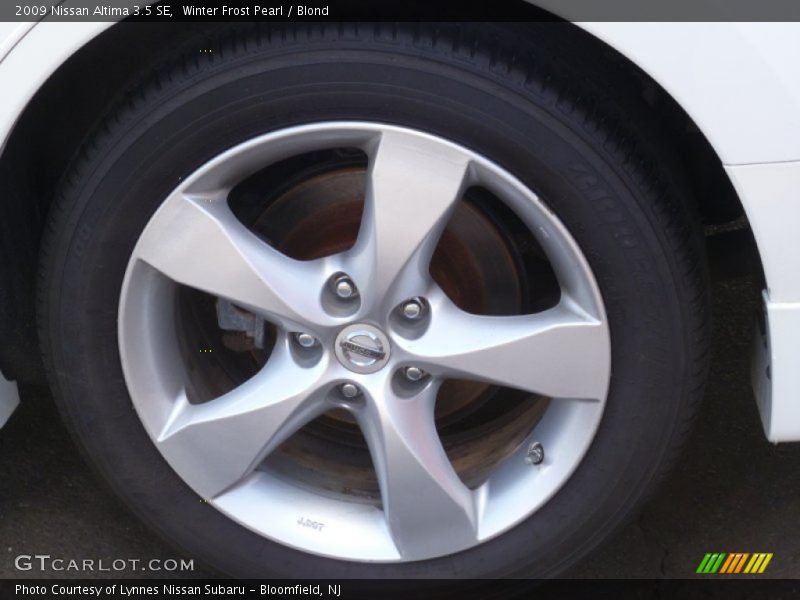 Winter Frost Pearl / Blond 2009 Nissan Altima 3.5 SE