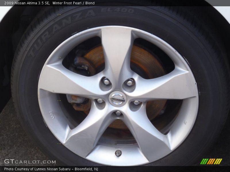 Winter Frost Pearl / Blond 2009 Nissan Altima 3.5 SE