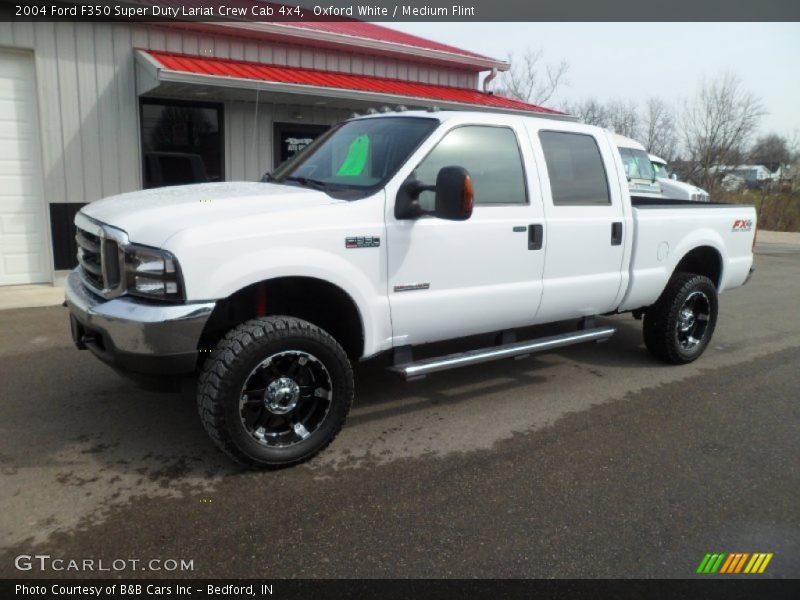 Front 3/4 View of 2004 F350 Super Duty Lariat Crew Cab 4x4