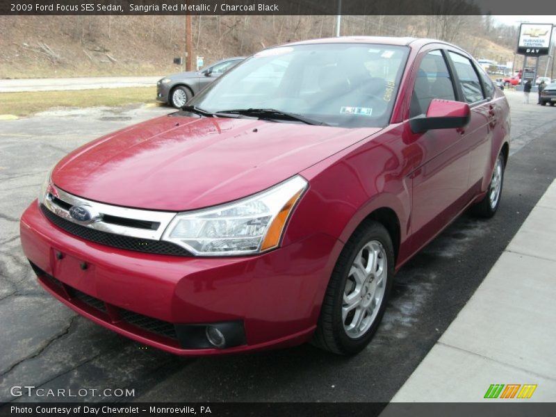 Sangria Red Metallic / Charcoal Black 2009 Ford Focus SES Sedan