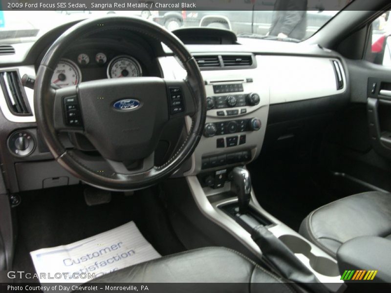 Sangria Red Metallic / Charcoal Black 2009 Ford Focus SES Sedan