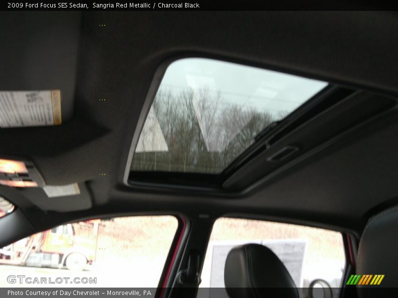 Sangria Red Metallic / Charcoal Black 2009 Ford Focus SES Sedan