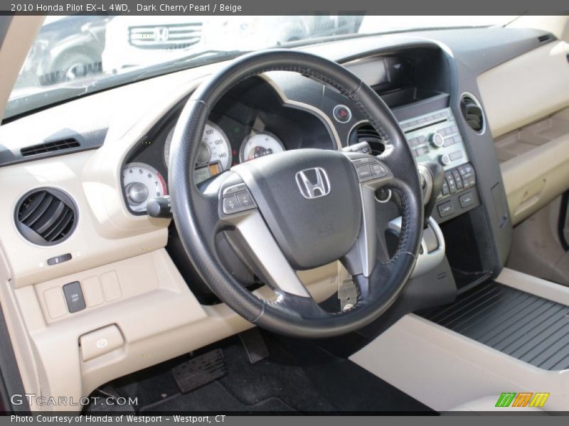 Dark Cherry Pearl / Beige 2010 Honda Pilot EX-L 4WD