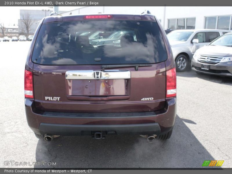 Dark Cherry Pearl / Beige 2010 Honda Pilot EX-L 4WD