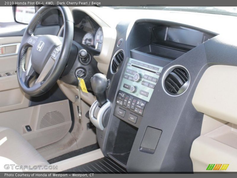 Dark Cherry Pearl / Beige 2010 Honda Pilot EX-L 4WD