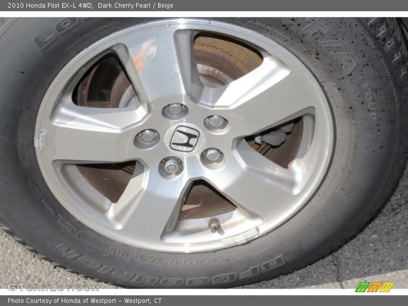 Dark Cherry Pearl / Beige 2010 Honda Pilot EX-L 4WD