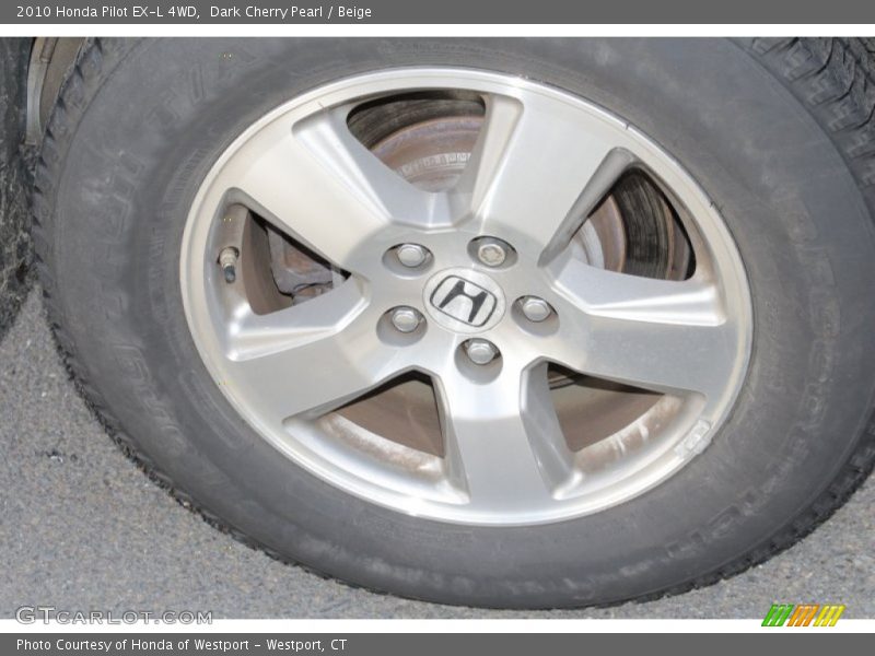 Dark Cherry Pearl / Beige 2010 Honda Pilot EX-L 4WD