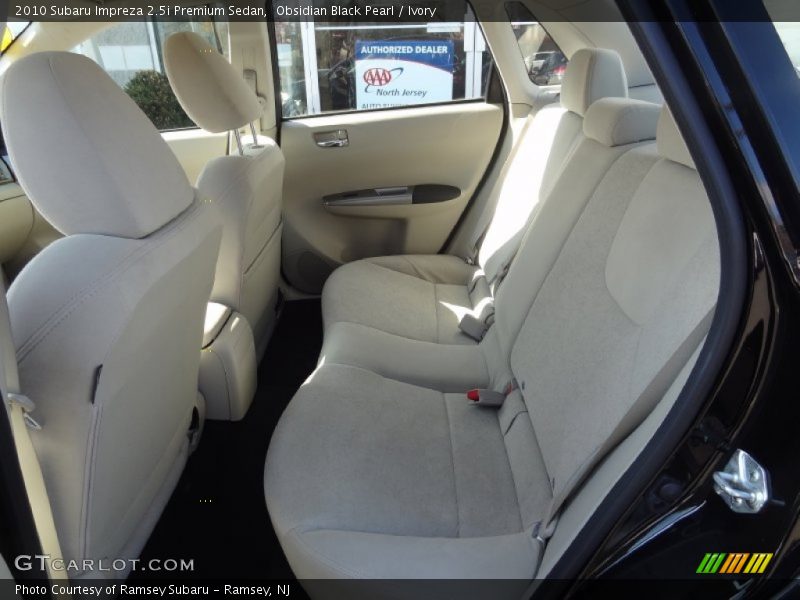 Obsidian Black Pearl / Ivory 2010 Subaru Impreza 2.5i Premium Sedan