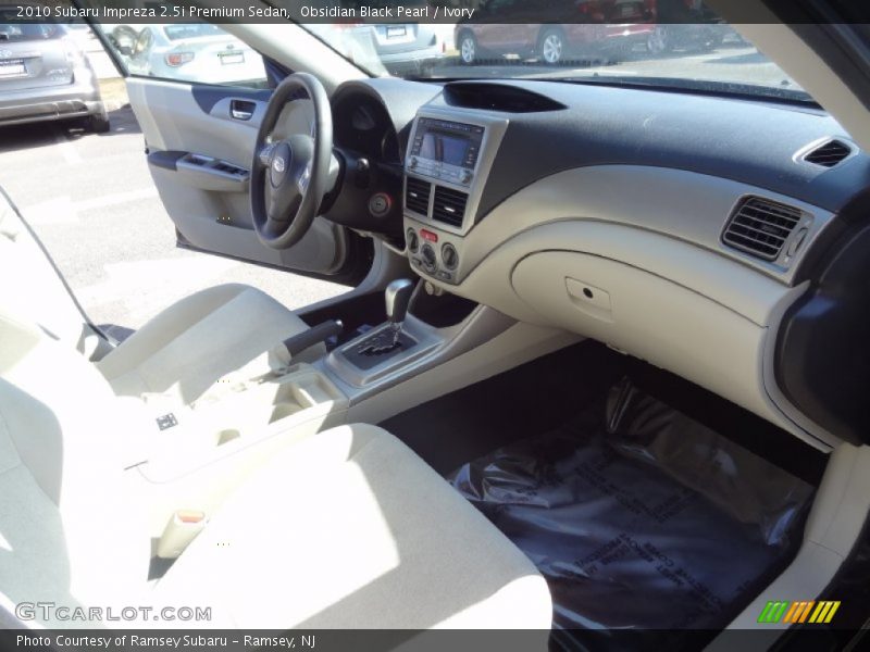 Obsidian Black Pearl / Ivory 2010 Subaru Impreza 2.5i Premium Sedan