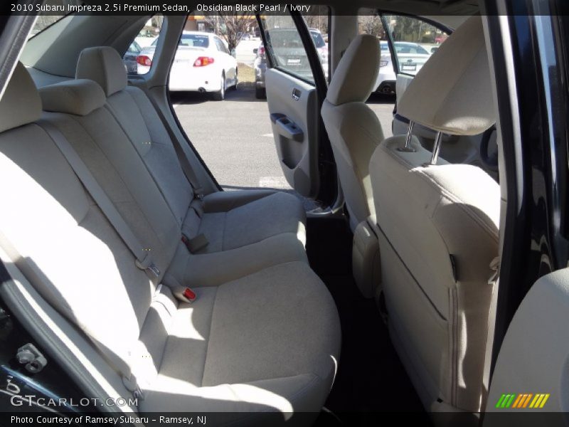 Obsidian Black Pearl / Ivory 2010 Subaru Impreza 2.5i Premium Sedan