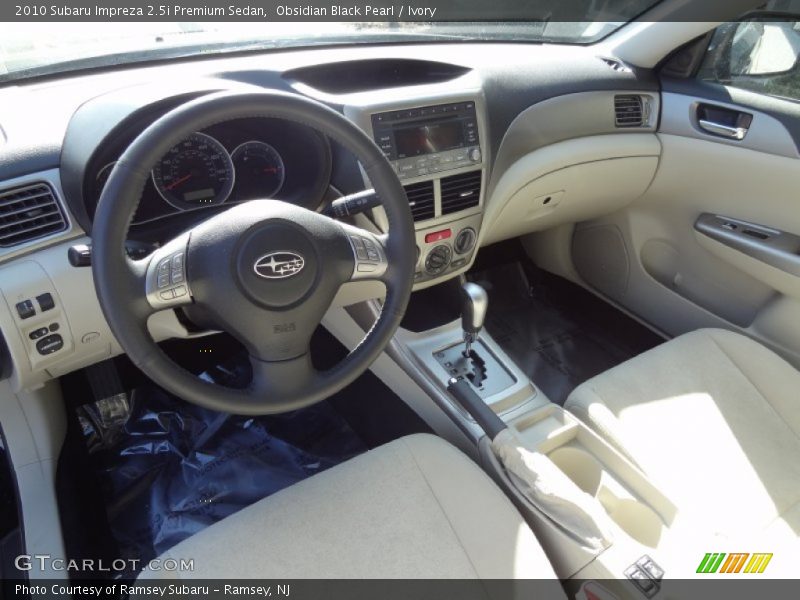 Obsidian Black Pearl / Ivory 2010 Subaru Impreza 2.5i Premium Sedan