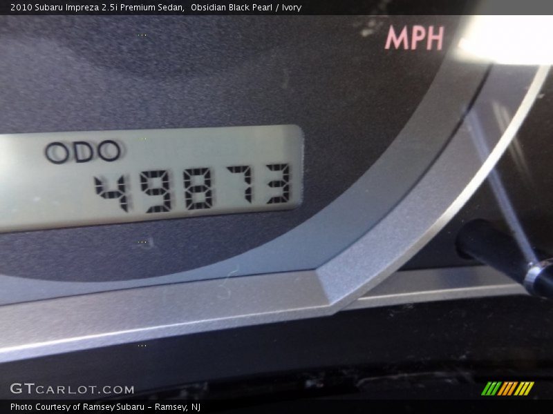 Obsidian Black Pearl / Ivory 2010 Subaru Impreza 2.5i Premium Sedan