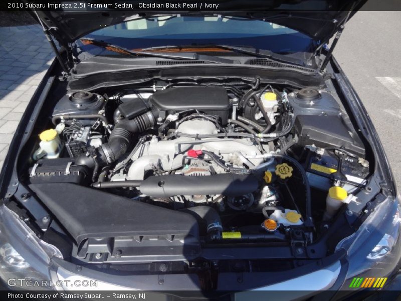 Obsidian Black Pearl / Ivory 2010 Subaru Impreza 2.5i Premium Sedan