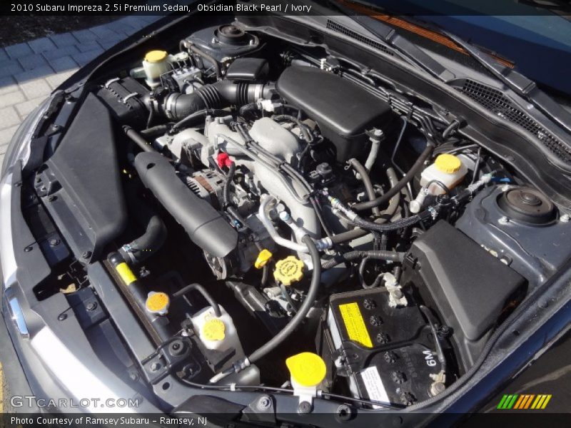 Obsidian Black Pearl / Ivory 2010 Subaru Impreza 2.5i Premium Sedan