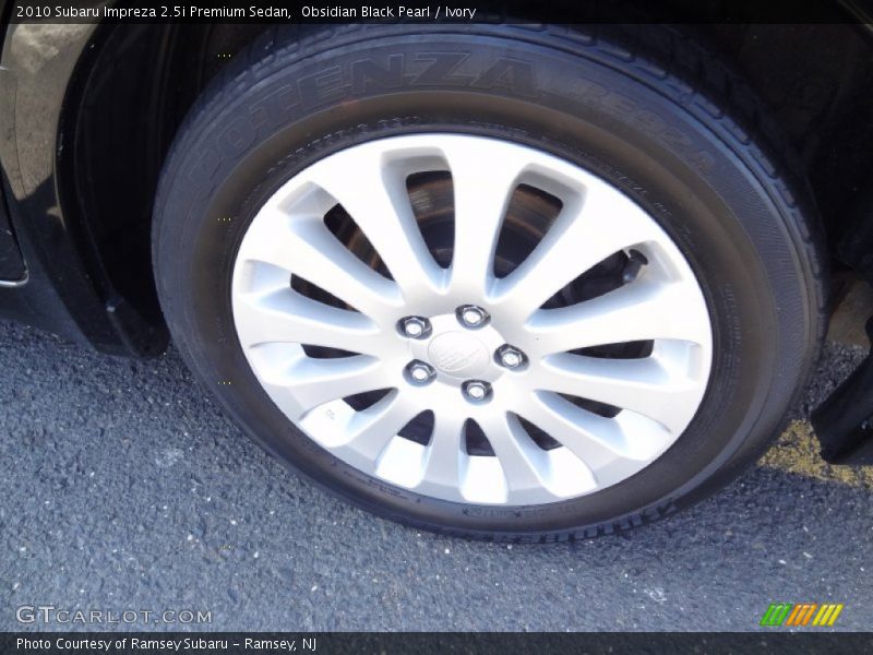 Obsidian Black Pearl / Ivory 2010 Subaru Impreza 2.5i Premium Sedan