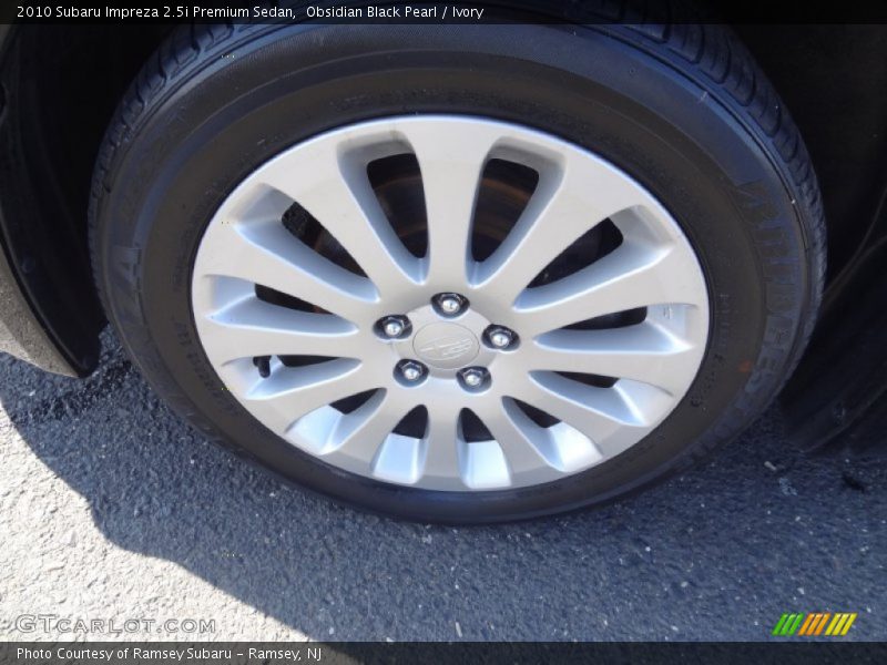 Obsidian Black Pearl / Ivory 2010 Subaru Impreza 2.5i Premium Sedan