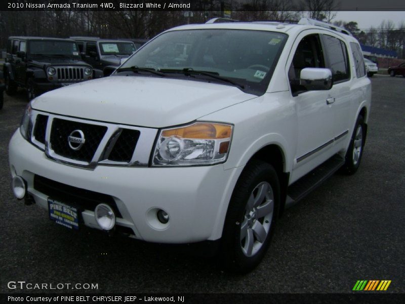 Blizzard White / Almond 2010 Nissan Armada Titanium 4WD