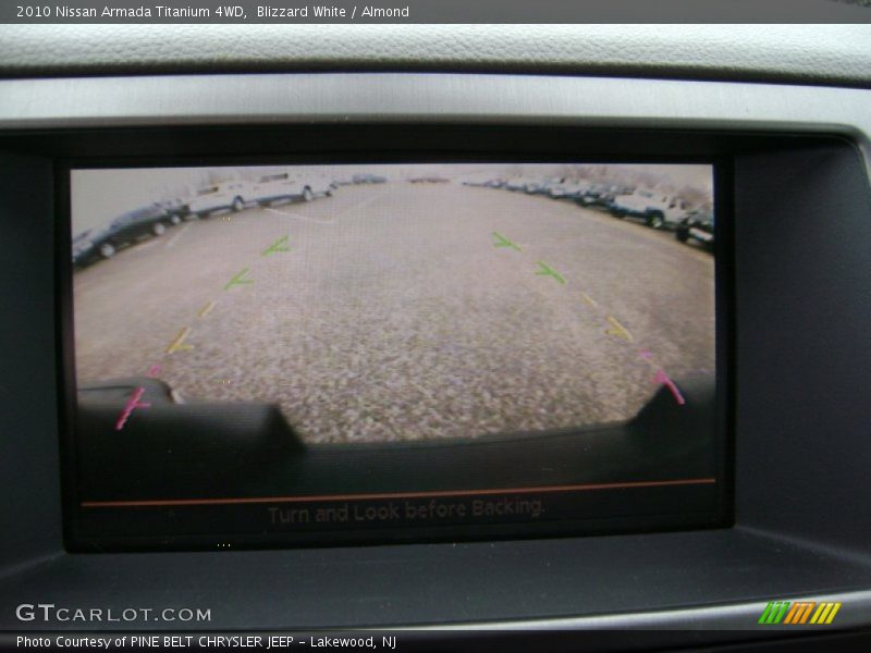 Blizzard White / Almond 2010 Nissan Armada Titanium 4WD