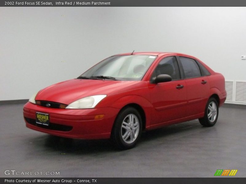 Infra Red / Medium Parchment 2002 Ford Focus SE Sedan