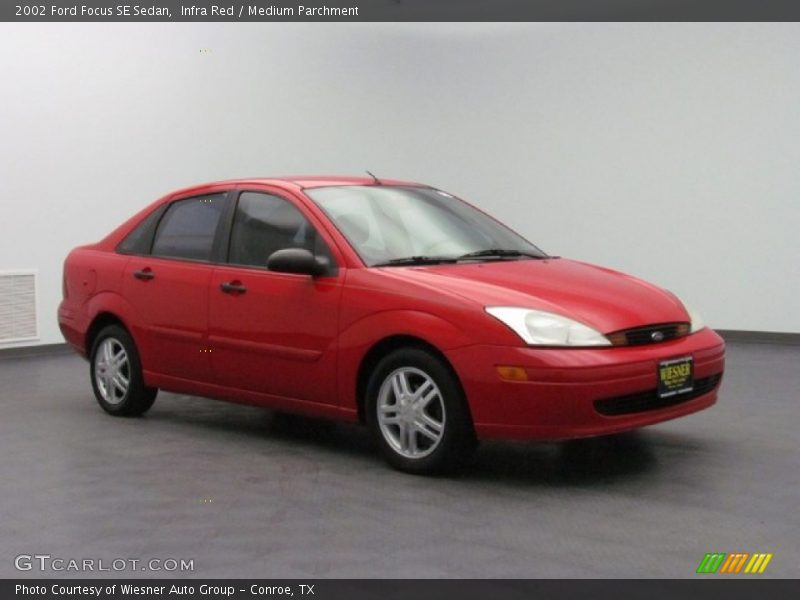Infra Red / Medium Parchment 2002 Ford Focus SE Sedan