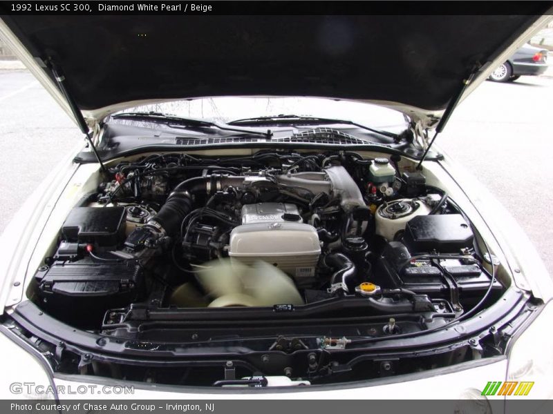Diamond White Pearl / Beige 1992 Lexus SC 300