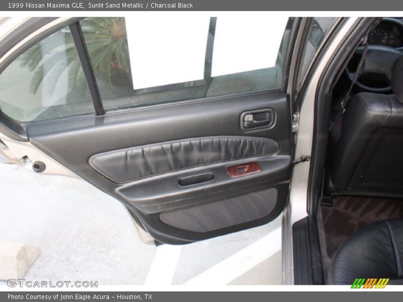 Sunlit Sand Metallic / Charcoal Black 1999 Nissan Maxima GLE