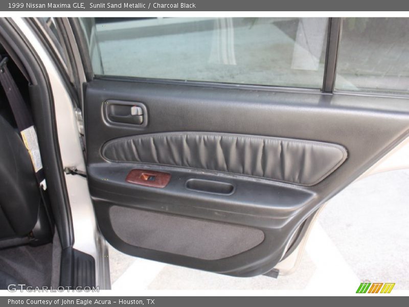 Sunlit Sand Metallic / Charcoal Black 1999 Nissan Maxima GLE