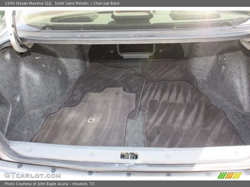 Sunlit Sand Metallic / Charcoal Black 1999 Nissan Maxima GLE