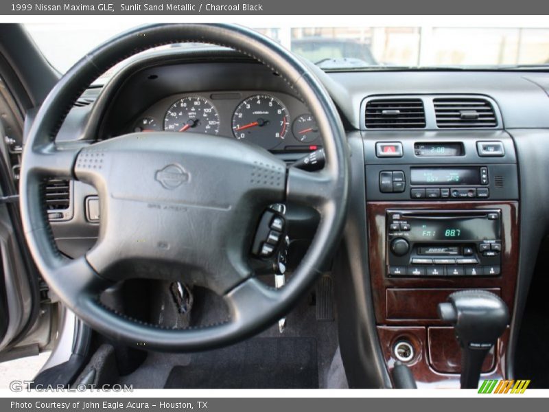 Sunlit Sand Metallic / Charcoal Black 1999 Nissan Maxima GLE