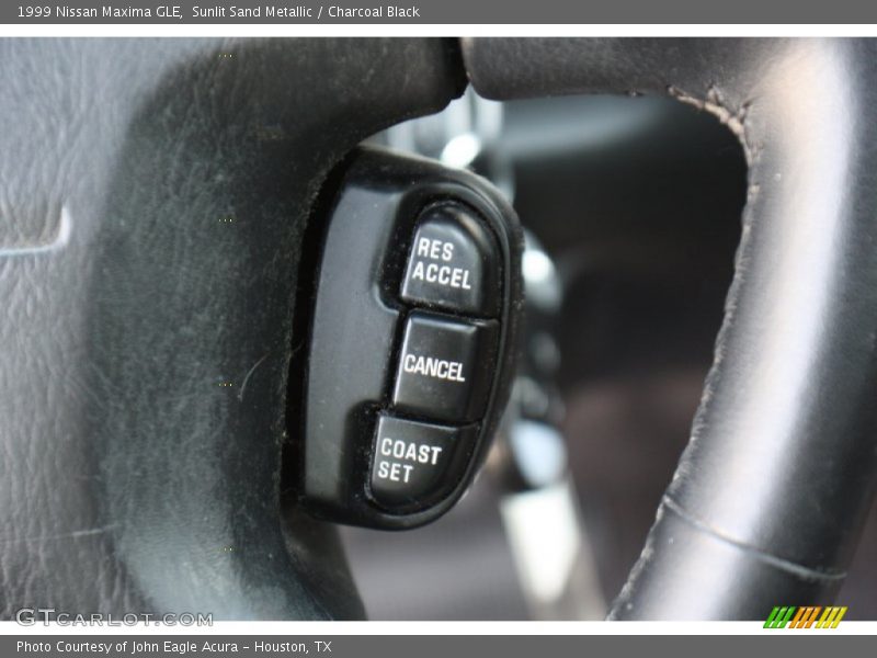 Sunlit Sand Metallic / Charcoal Black 1999 Nissan Maxima GLE