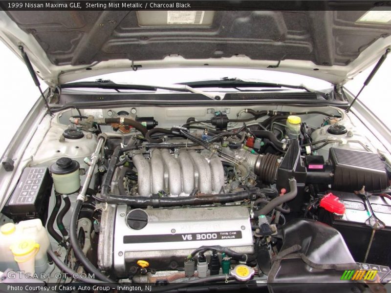 Sterling Mist Metallic / Charcoal Black 1999 Nissan Maxima GLE