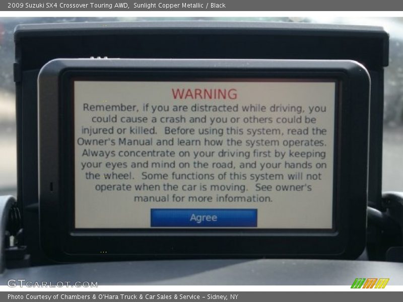 Sunlight Copper Metallic / Black 2009 Suzuki SX4 Crossover Touring AWD