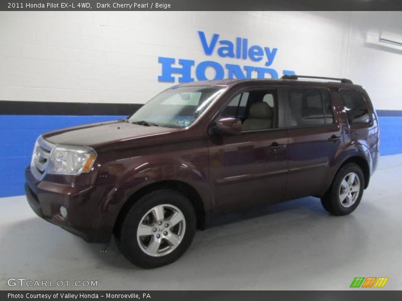 Dark Cherry Pearl / Beige 2011 Honda Pilot EX-L 4WD