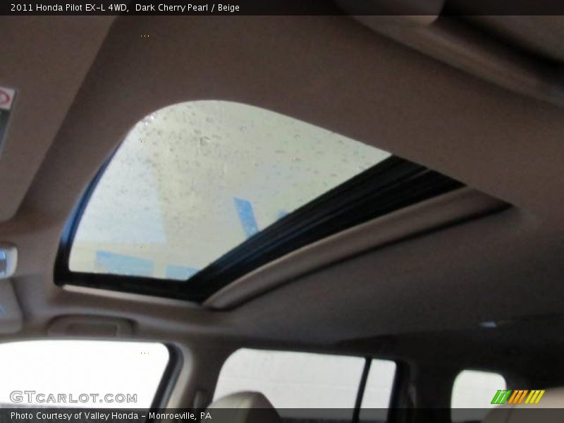 Dark Cherry Pearl / Beige 2011 Honda Pilot EX-L 4WD