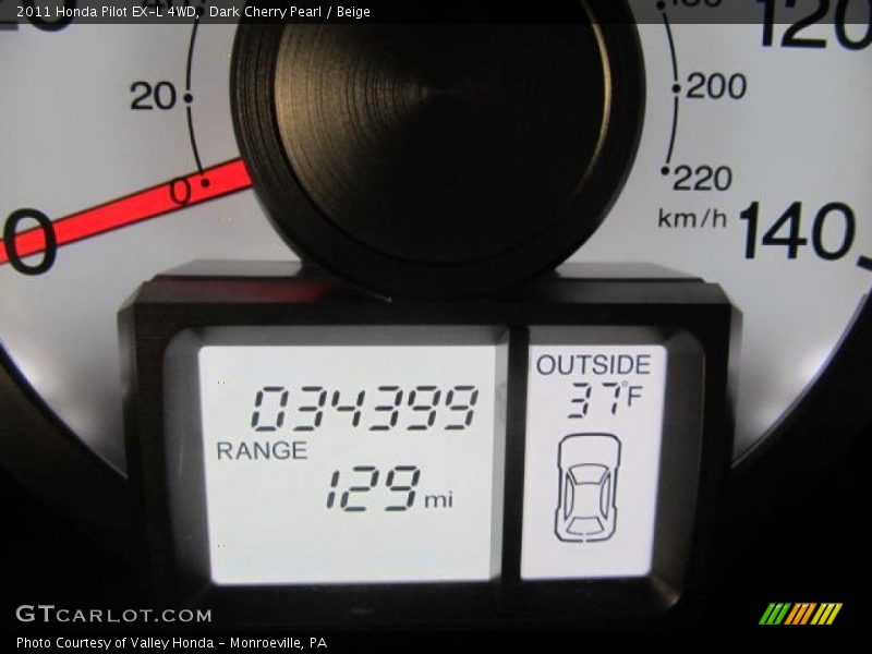 Dark Cherry Pearl / Beige 2011 Honda Pilot EX-L 4WD