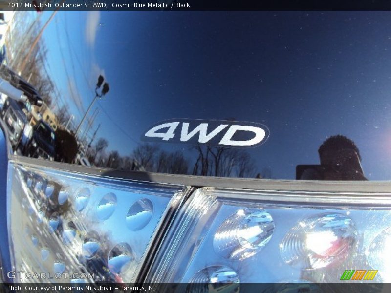 Cosmic Blue Metallic / Black 2012 Mitsubishi Outlander SE AWD